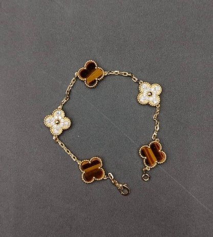 Pulsos Van Cleef plata 925 con baño de oro 18k